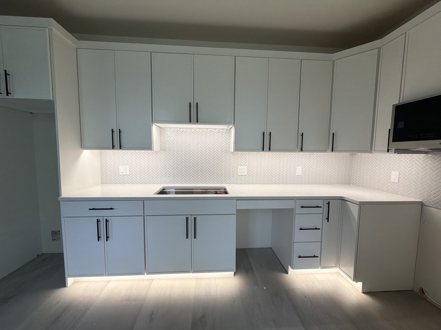Kitchen cabinet, backsplash and toe-kick accent lighting by Brens Electric