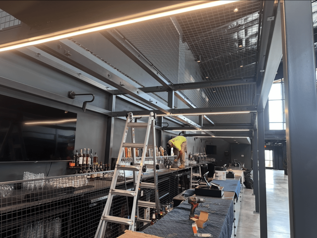 Electrical installation underway in a large commercial space