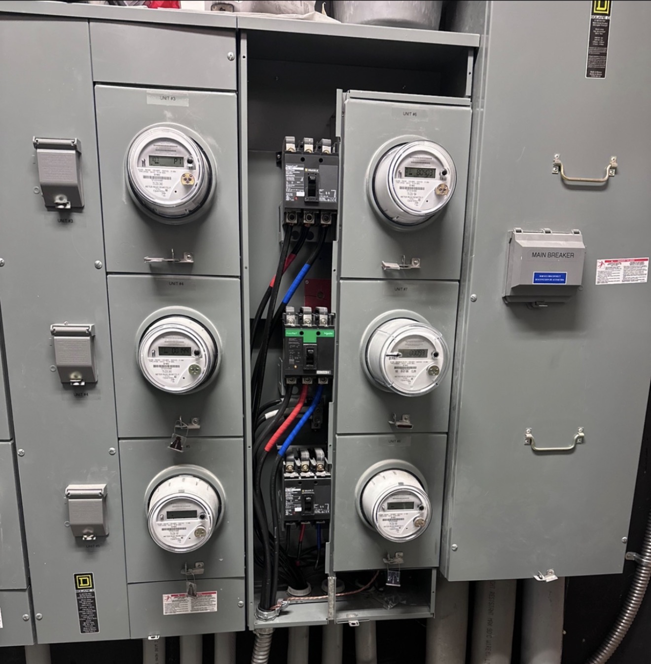 Multi-meter electrical service and distribution equipment installed for a multifamily property